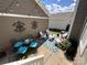 Charming patio area with outdoor seating, decorative string lights, and stylish decor at 2007 Bishops Ct, Cornelius, NC 28031