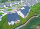 Aerial view of new home construction backing up to green space and landscaping at 2085 Bonds Ln # 26, Fort Mill, SC 29715