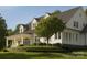 Charming white home with a manicured lawn and classic architectural details at 21121 Shearer Rd, Davidson, NC 28036