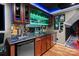 Basement bar area with cabinets, granite counters, beverage fridge, and tap at 2213 Normandin Ct, Charlotte, NC 28216