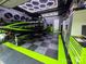 High-end garage with a boat, tool storage, and cabinets at 2213 Normandin Ct, Charlotte, NC 28216