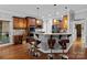 Gourmet kitchen featuring a breakfast bar, pendant lighting, and modern stainless appliances at 2213 Normandin Ct, Charlotte, NC 28216