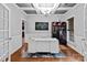 Well-lit office space with decorative ceilings, built-in display case, and large windows at 2213 Normandin Ct, Charlotte, NC 28216