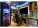 Gaming room with entertainment system, black chair, and desk at 2213 Normandin Ct, Charlotte, NC 28216