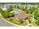 Aerial view of the clubhouse, pool, lush greenery, and surrounding homes at 244 River Clay Rd, Fort Mill, SC 29708