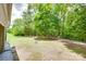 Backyard with green grass and large trees at 244 River Clay Rd, Fort Mill, SC 29708