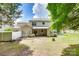 View of the backyard featuring a well-maintained lawn and partial fencing at 244 River Clay Rd, Fort Mill, SC 29708
