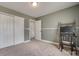 Neutral bedroom with a double door closet and a desk with a chair at 244 River Clay Rd, Fort Mill, SC 29708