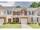 Charming townhome featuring a well-manicured lawn and a one-car garage and neutral colors at 244 River Clay Rd, Fort Mill, SC 29708