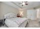 A comfortable main bedroom provides neutral colors, natural lighting, and a ceiling fan at 244 River Clay Rd, Fort Mill, SC 29708