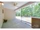 The screened patio overlooks the serene outdoors at 244 River Clay Rd, Fort Mill, SC 29708
