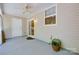 Covered patio with a ceiling fan, door, and window at 244 River Clay Rd, Fort Mill, SC 29708