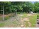 Expansive backyard with mature trees and lush greenery at 2763 Rivendale Ct, Indian Land, SC 29707