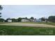Community basketball court with playground and splashpad in the background at 2763 Rivendale Ct, Indian Land, SC 29707