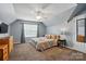 Spacious bedroom features neutral walls, carpet flooring, and natural light at 2763 Rivendale Ct, Indian Land, SC 29707