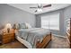 Charming bedroom features a cozy bed, window, and wooden furniture at 2763 Rivendale Ct, Indian Land, SC 29707