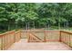 Elevated wooden deck with railing, providing scenic views at 2763 Rivendale Ct, Indian Land, SC 29707