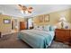 Spacious main bedroom with carpet flooring, decor, and ensuite bathroom at 2763 Rivendale Ct, Indian Land, SC 29707
