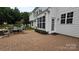 Charming patio with brick pavers, a dining set, and a view of the home's exterior at 2763 Rivendale Ct, Indian Land, SC 29707