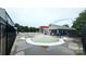 A splash pad with vibrant colors and a playful fountain, perfect for a fun and refreshing experience at 2763 Rivendale Ct, Indian Land, SC 29707