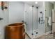 Bathroom featuring a stand-alone copper tub and a glass shower with stylish tile work at 2845 Lakefront Dr, Belmont, NC 28012