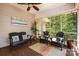 Relaxing screened porch featuring comfortable seating and views of the outdoors at 2845 Lakefront Dr, Belmont, NC 28012