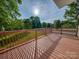Spacious back deck with sturdy railing, perfect for enjoying the view and soaking up the sun at 300 W 12Th St, Salisbury, NC 28144