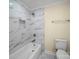 Bathroom features tile surround bath and modern toilet at 300 W 12Th St, Salisbury, NC 28144