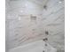 Bathroom featuring white marble tile surround bath and rain-style shower head at 300 W 12Th St, Salisbury, NC 28144