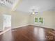 Spacious living room with hardwood floors, a ceiling fan and natural light coming through the windows at 300 W 12Th St, Salisbury, NC 28144