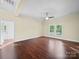Spacious living room with hardwood floors, a ceiling fan and natural light coming through the windows at 300 W 12Th St, Salisbury, NC 28144
