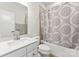 Bathroom featuring a neutral color scheme, a shower/tub combo, and a white sink and toilet at 3003 Salix Bend Dr, Charlotte, NC 28205