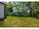 Spacious, green backyard offers plenty of room for outdoor activities and relaxation at 321 Whitner St, Rock Hill, SC 29732