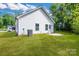 An expansive backyard with a patio, great for entertaining, and an external door to the home at 321 Whitner St, Rock Hill, SC 29732