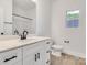 Bathroom with modern vanity, sleek black fixtures, and a well-lit mirror at 321 Whitner St, Rock Hill, SC 29732