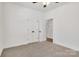 Bedroom with carpet and closet with double doors at 321 Whitner St, Rock Hill, SC 29732