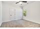 Comfortable bedroom with soft carpet, a ceiling fan and natural light from the window at 321 Whitner St, Rock Hill, SC 29732