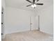 Bright bedroom features neutral carpet, ceiling fan, and fresh white walls at 321 Whitner St, Rock Hill, SC 29732