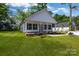 Beautiful, well-maintained home with a lush green lawn and an inviting covered porch at 321 Whitner St, Rock Hill, SC 29732
