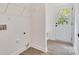 Clean laundry room with shelving and hookups for washer and dryer at 321 Whitner St, Rock Hill, SC 29732