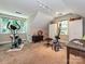 Versatile bonus room with a wall of windows, storage, and potential uses as an art studio or gym at 4951 Dayspring Dr, Mint Hill, NC 28227