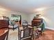 Cozy living room with hardwood floors, an antique desk, and natural light, creating a warm and inviting space at 4951 Dayspring Dr, Mint Hill, NC 28227