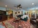 Comfortable living room with hardwood floors, a fireplace, and an open layout at 4951 Dayspring Dr, Mint Hill, NC 28227