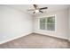 Carpeted bedroom with ceiling fan, window, base trim, and outlets ready for you to call it home at 5183 Mill Race Ln, Lancaster, SC 29720