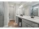 Modern bathroom with double vanity, sleek fixtures, and stylish tile work at 5723 Notch Peak Ave, Indian Land, SC 29707