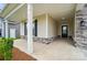 Inviting front porch with stone accents, offering a glimpse of the entrance at 5723 Notch Peak Ave, Indian Land, SC 29707