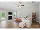 Bright living room with fireplace and plush seating, perfect for relaxation and gatherings at 5723 Notch Peak Ave, Indian Land, SC 29707