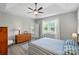 Bright bedroom with natural light, featuring wood floors and neutral decor at 5723 Notch Peak Ave, Indian Land, SC 29707