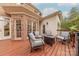 Enjoy this charming deck with comfortable seating and a firepit for relaxing outdoors at 6024 Highview Rd, Weddington, NC 28104