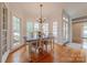 Charming dining room with bright windows and hardwood floors at 6024 Highview Rd, Weddington, NC 28104